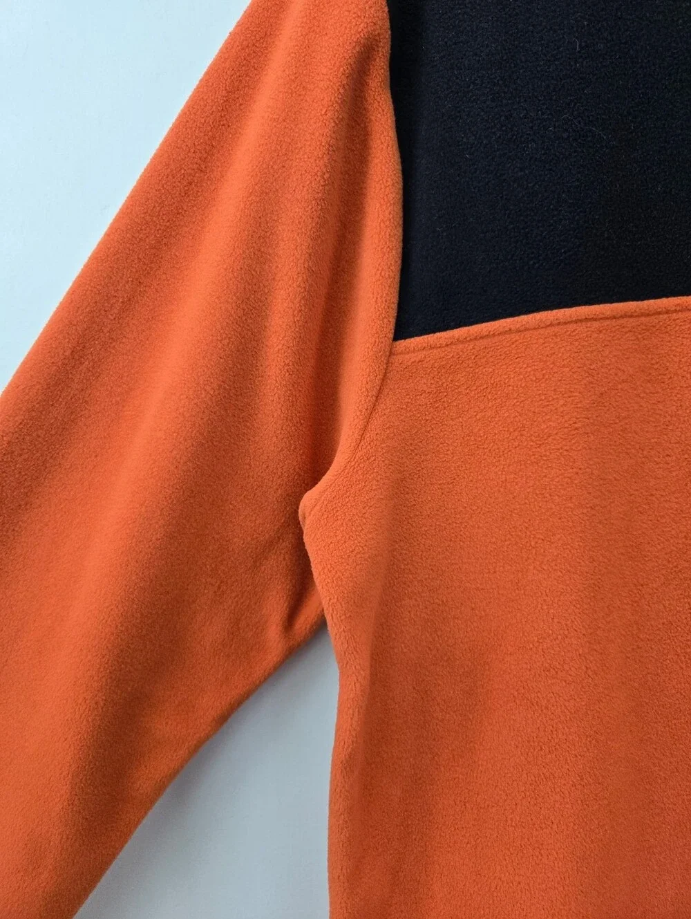 The North Face TKA Glacier Snap-Neck Pullover. Burnt Ochre/TNF Black. Size Small